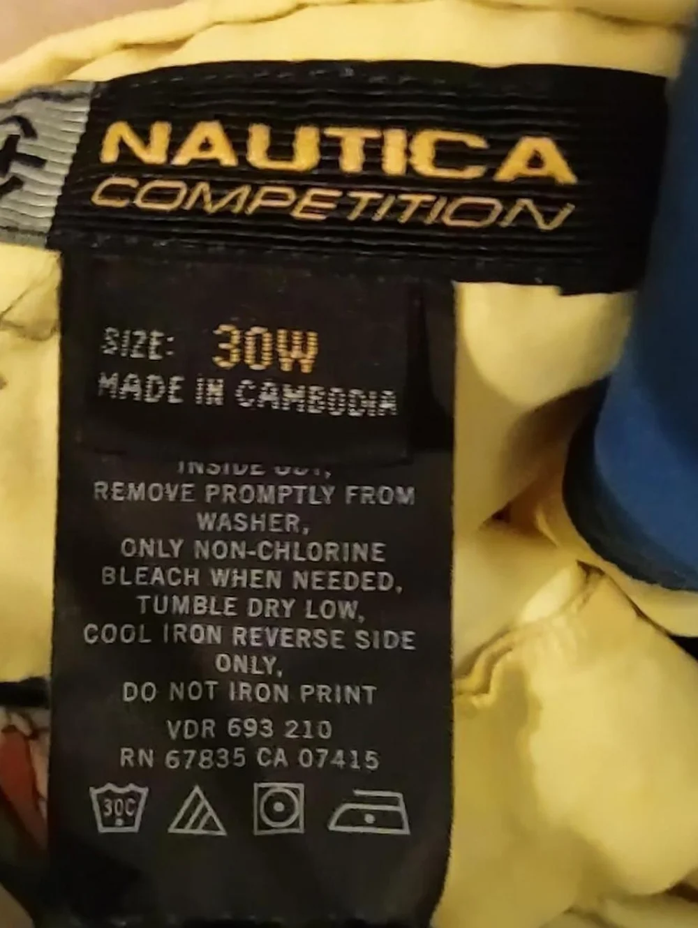 yellow and blue swim trunks from nautica competition size 30W